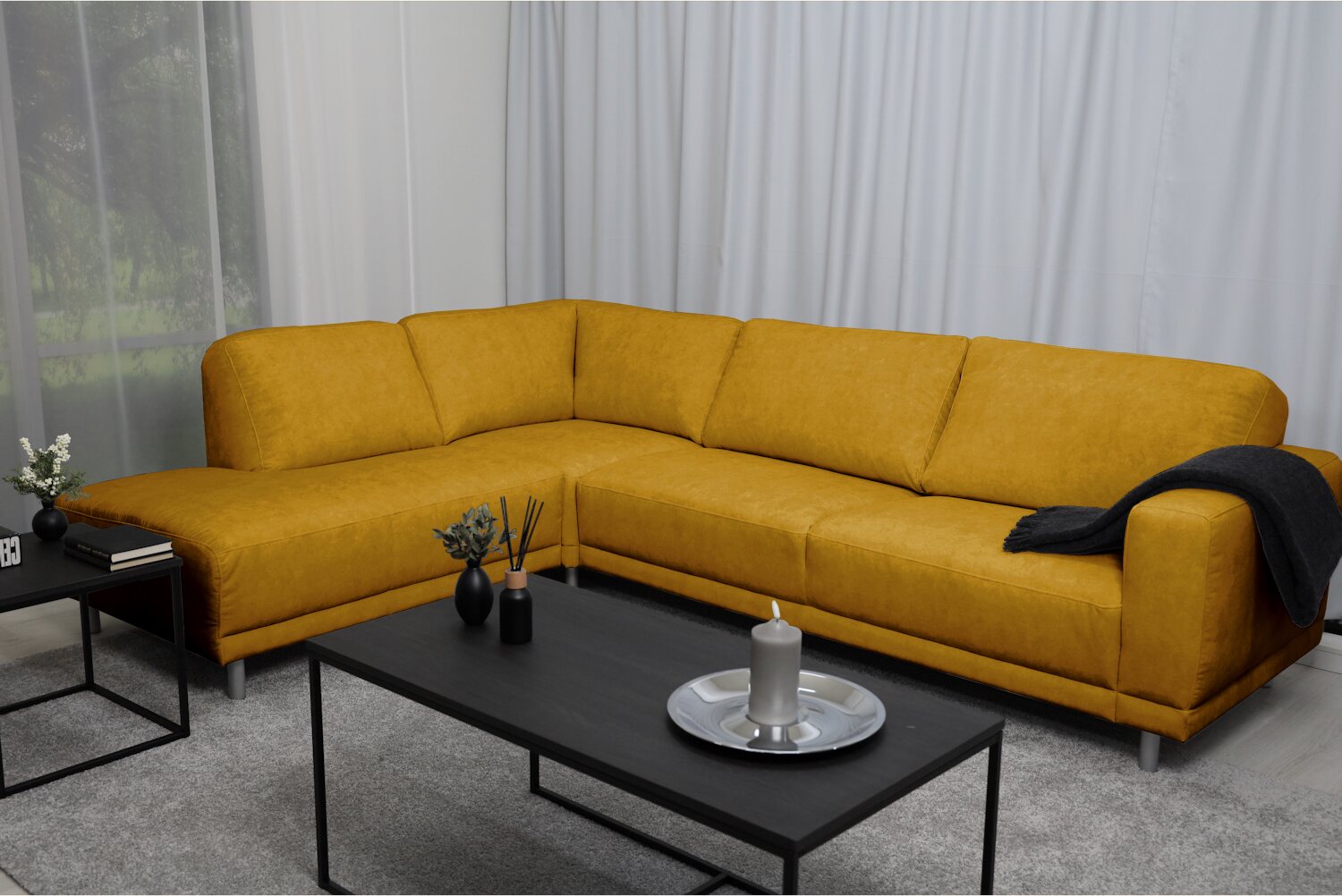 Huonekalukeidas-mallisto Pompano avokulmasohva. Mea-kangasverhoilulla. Useita värivaihtoehtoja. Edestäkatsottuna vasemmalla